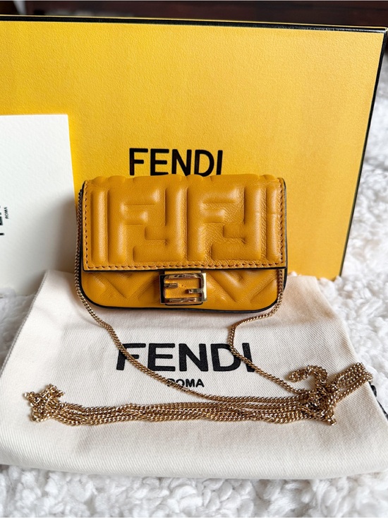 Fendi Handbags - Fendi Zucca FF Baguette Super Nano crossbody bag , charm, earpod purse